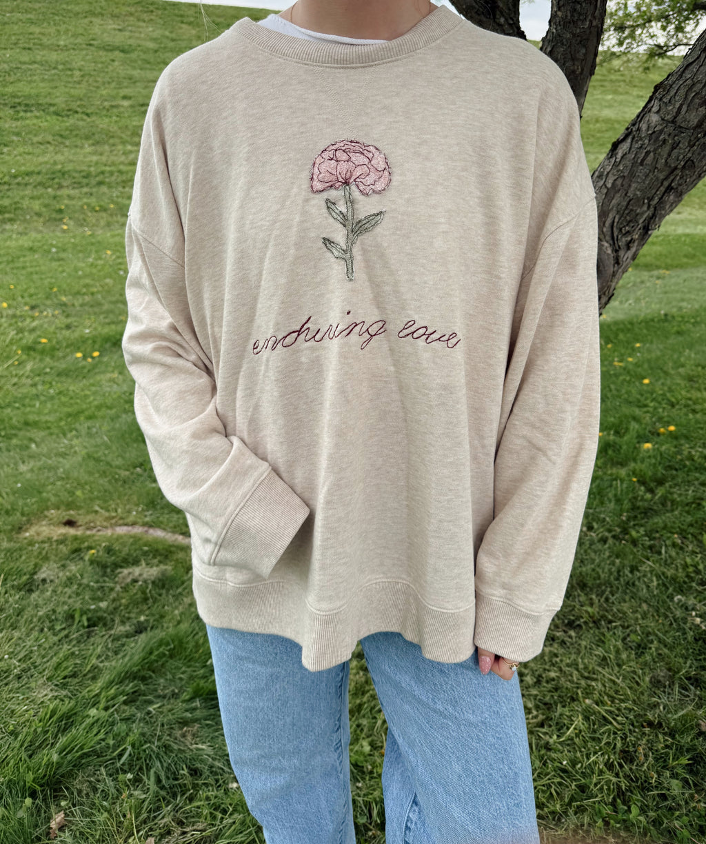 “enduring love” patchwork crewneck