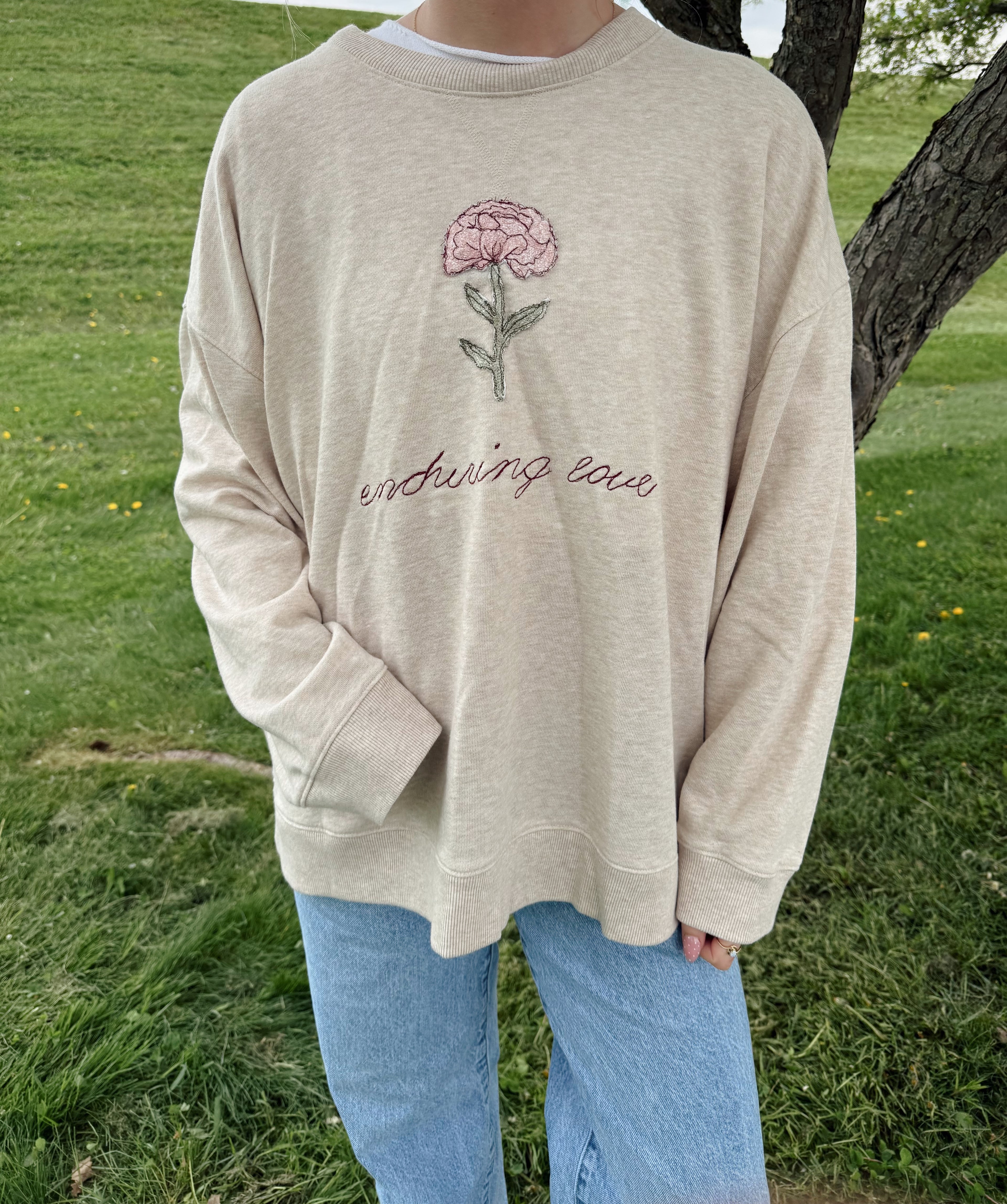 “enduring love” patchwork crewneck