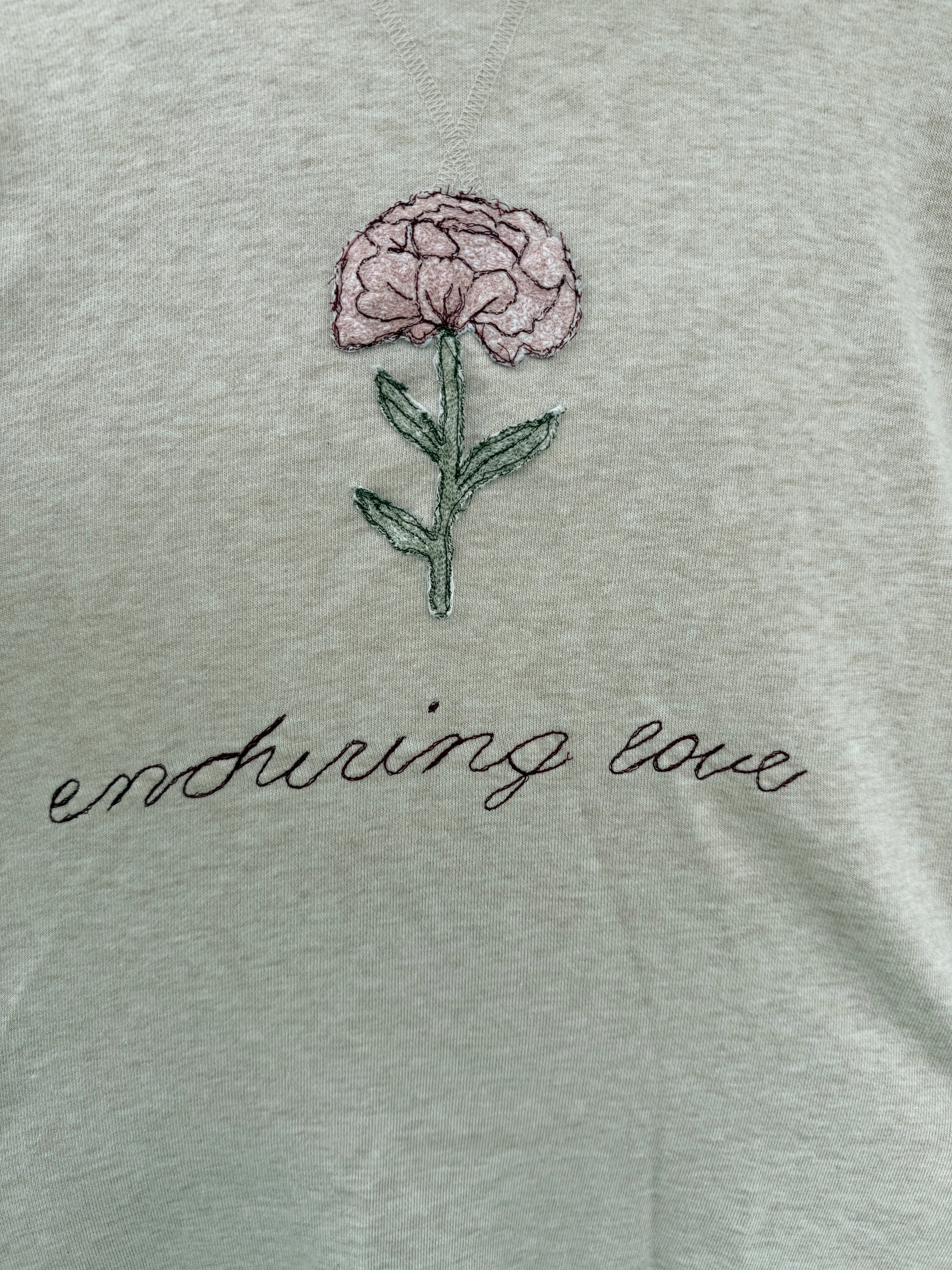 “enduring love” patchwork crewneck