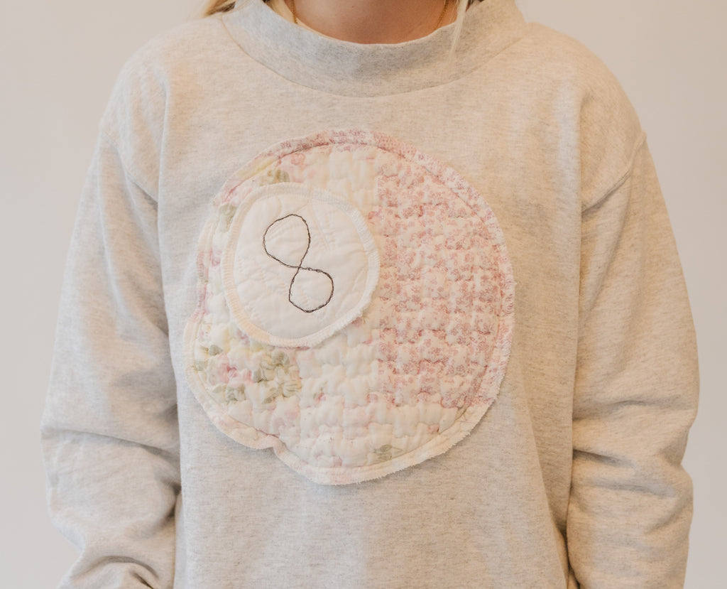 eight ball patchwork mock neck