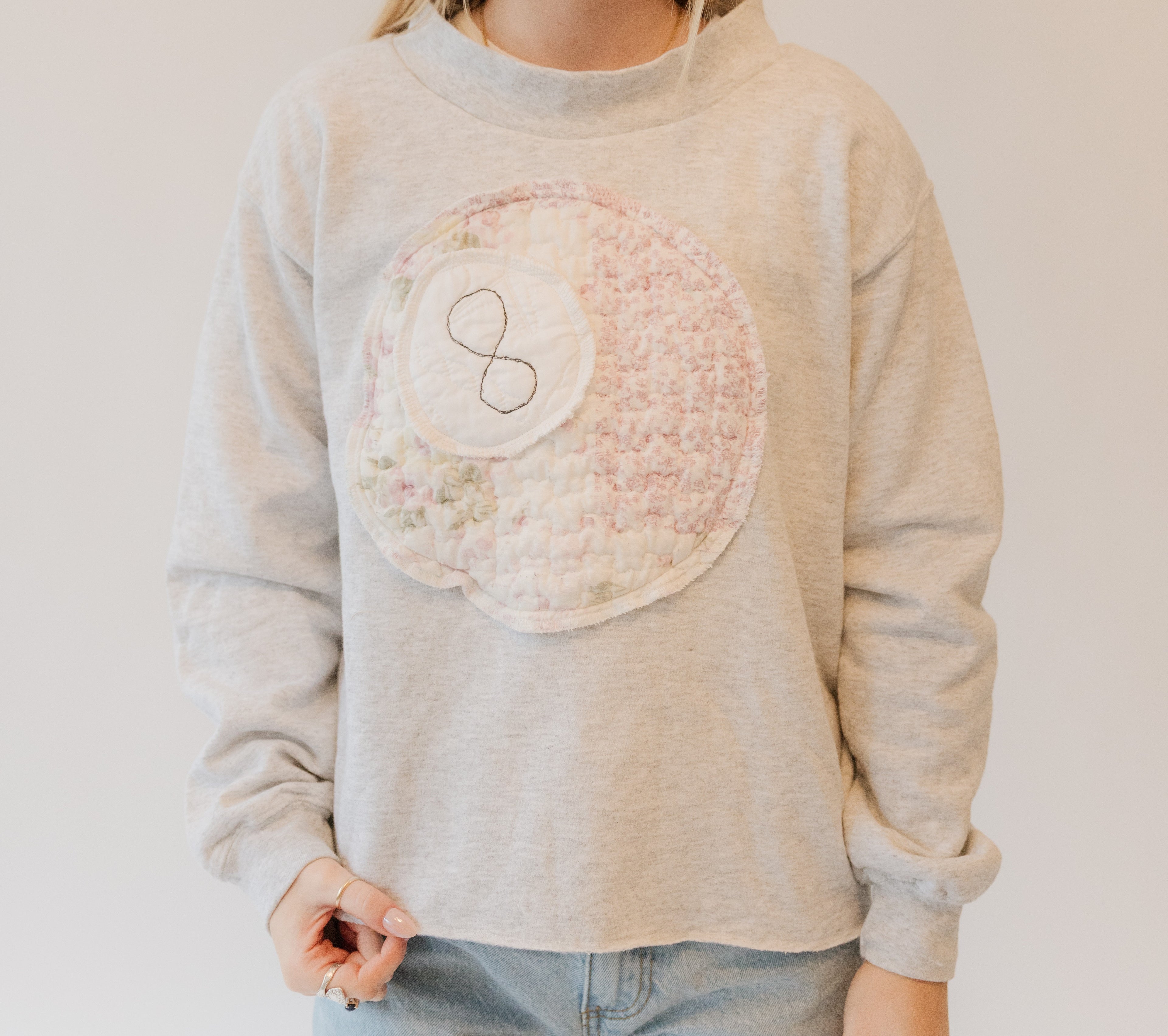 eight ball patchwork mock neck