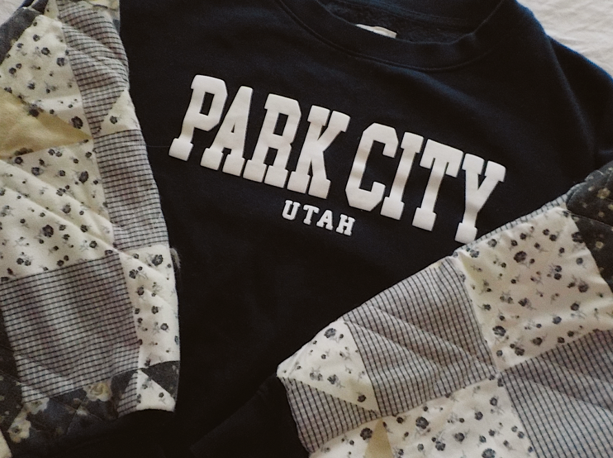 park city quilted sleeve crewneck