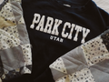 park city quilted sleeve crewneck