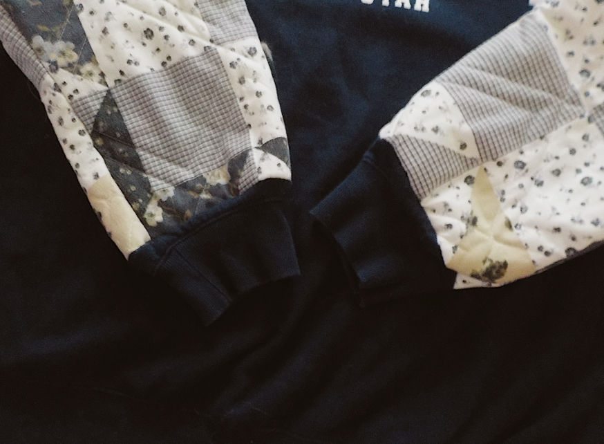 park city quilted sleeve crewneck