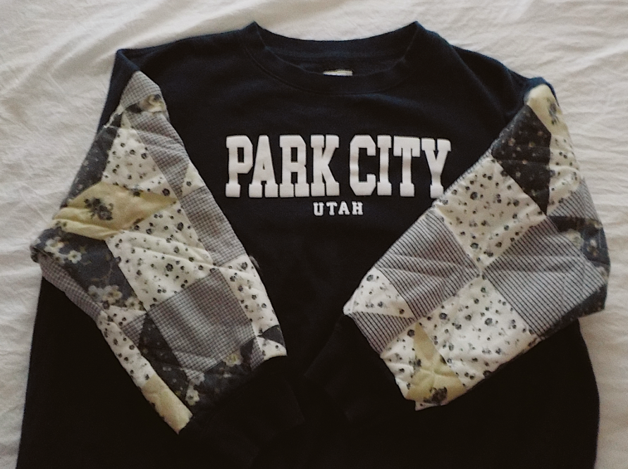 park city quilted sleeve crewneck